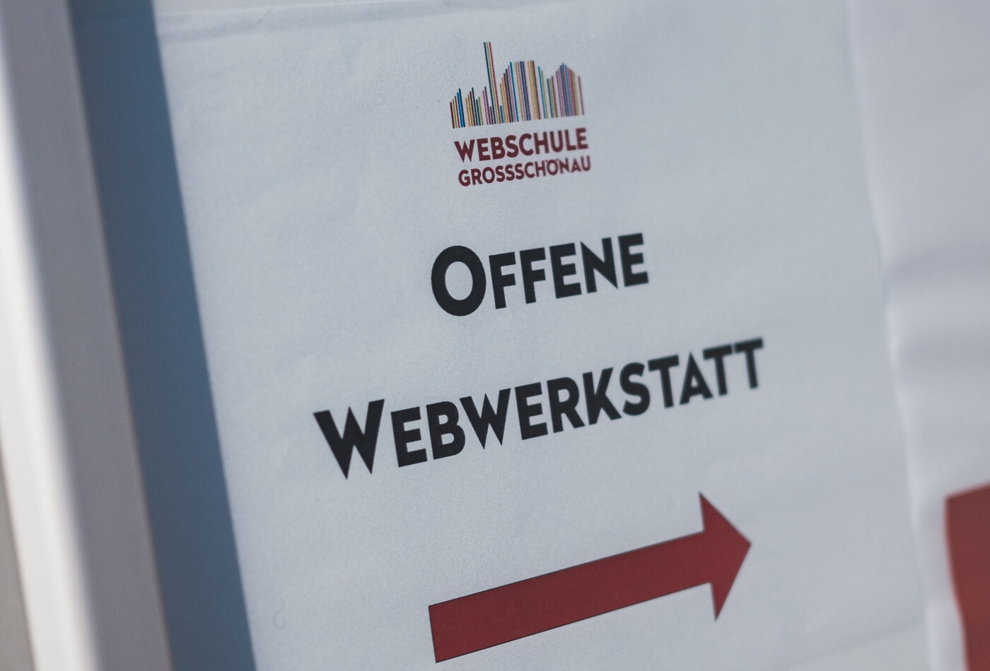 Ein Bild mit der Aufschrift: Offene Webwerkstatt